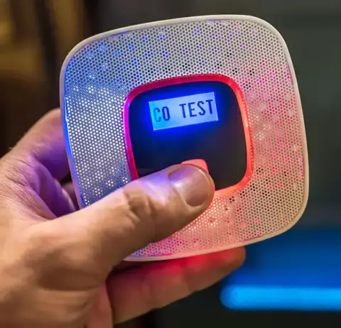 Man runs a CO2 test in his home.